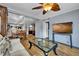 View of the open floor plan of the living room and dining room and kitchen at 1841 Ruth Dr, Thornton, CO 80229