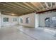 Unfinished basement with concrete floors, white walls, and windows, ready for customization at 2305 Prospect Ln, Broomfield, CO 80023