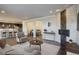 Open concept living space featuring a fireplace, seamlessly connecting the kitchen and dining areas at 2305 Prospect Ln, Broomfield, CO 80023