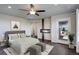 Beautiful primary bedroom with fireplace and access to private patio at 2305 Prospect Ln, Broomfield, CO 80023