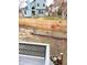 Backyard featuring a wooden fence, sparse grass, and a small garden at 4243 Flanders St, Denver, CO 80249
