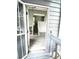 Open foyer with light gray flooring and staircase leading to the upper level at 4243 Flanders St, Denver, CO 80249