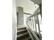 Hallway leading to a bright kitchen and featuring a skylight at 4243 Flanders St, Denver, CO 80249