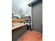Backyard featuring a hot tub and a wooden deck with lattice railings at 4243 Flanders St, Denver, CO 80249