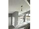 Bright kitchen with stainless steel appliances, skylight, and modern finishes at 4243 Flanders St, Denver, CO 80249