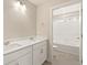 Bathroom featuring a double vanity with white countertops, and a bathtub at 1850 Sawtooth Mountain Dr, Berthoud, CO 80513
