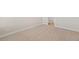 Bedroom featuring neutral carpet and a bathroom view at 1850 Sawtooth Mountain Dr, Berthoud, CO 80513
