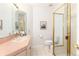Bathroom with tile flooring, shower, vanity, and a large mirror at 8047 S Fairfax Ct, Centennial, CO 80122