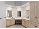 Beautiful bathroom featuring double sinks, vanity, and a center make up area at 8047 S Fairfax Ct, Centennial, CO 80122