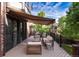 Outdoor deck with awning and casual seating arrangement perfect for entertaining at 8047 S Fairfax Ct, Centennial, CO 80122