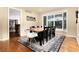 Dining area with large windows and hardwood floors at 8047 S Fairfax Ct, Centennial, CO 80122