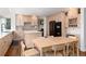 Bright eat-in kitchen features updated appliances and custom cabinetry at 8047 S Fairfax Ct, Centennial, CO 80122