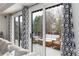 Outdoor patio area with ample seating, accessible from the living room at 8047 S Fairfax Ct, Centennial, CO 80122