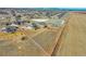 Aerial view of property with a large fenced-in lot and backyard at 16360 Paris Way, Brighton, CO 80602