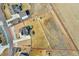 Large fenced property with home, playset, and ample space outlined in red boundary at 16360 Paris Way, Brighton, CO 80602