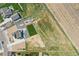 Aerial view of home with a large yard and playground at 16360 Paris Way, Brighton, CO 80602