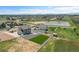 Aerial view of home in established neighborhood, with large yard and play area at 16360 Paris Way, Brighton, CO 80602