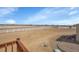Vast, fenced backyard with an unobstructed view, offering privacy and potential at 16360 Paris Way, Brighton, CO 80602