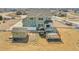 Aerial view of a backyard featuring a deck, a shed, and ample open space at 16360 Paris Way, Brighton, CO 80602