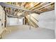 Spacious unfinished basement with visible beams and studs awaiting customization at 16360 Paris Way, Brighton, CO 80602