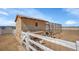 Large chicken coop with an enclosed run and secure fencing, ideal for poultry enthusiasts at 16360 Paris Way, Brighton, CO 80602