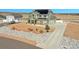 Suburban two-story home with solar panels, detached garage, and xeriscaped front yard; perfect for energy efficiency at 16360 Paris Way, Brighton, CO 80602