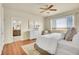 The main bedroom is bright and spacious with an ensuite bathroom, large windows, and ample natural light at 16360 Paris Way, Brighton, CO 80602