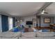 Inviting living room features modern furnishings and decor, perfect for relaxing and entertaining guests at 1571 Sheridan Blvd, Lakewood, CO 80214