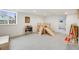 Finished basement featuring carpet, an indoor climber and slide, and a window at 3166 W Indian Summer Ln, Castle Rock, CO 80109