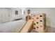 Finished basement featuring carpet, an indoor climber and slide, and a window at 3166 W Indian Summer Ln, Castle Rock, CO 80109