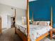 Primary bedroom with a walk-in closet and ensuite bathroom at 5860 W Atlantic Dr, Lakewood, CO 80227