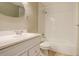 Clean bathroom with white subway tile shower and a vanity with a white sink at 7165 S Gaylord St # E09, Centennial, CO 80122