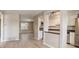 Open concept floor plan showing the kitchen and living space with an abundance of natural light at 7165 S Gaylord St # E09, Centennial, CO 80122