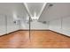 Spacious basement features a wood floor, white walls, and small windows at 3792 S Fenton Way, Denver, CO 80235