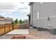 Home's backyard features a concrete patio, privacy fence and an area for gardening or other outdoor activities at 15977 Red Bud Dr, Parker, CO 80134