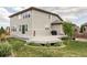 Lovely two-story home with a spacious back deck perfect for outdoor entertaining and relaxing at 15977 Red Bud Dr, Parker, CO 80134