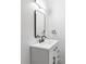 Modern bathroom featuring vanity with frameless mirror and sleek black hardware at 15977 Red Bud Dr, Parker, CO 80134