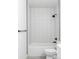 Clean white tub and shower with black trim at 15977 Red Bud Dr, Parker, CO 80134