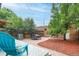 Landscaped backyard featuring an outdoor dining area and patio seating at 2211 W 33Rd Ave, Denver, CO 80211