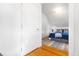 Cozy bedroom featuring a comfortable bed, soft lighting, and hardwood floors at 2211 W 33Rd Ave, Denver, CO 80211
