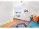 Bedroom featuring hardwood floors, natural light, and tasteful décor at 2211 W 33Rd Ave, Denver, CO 80211