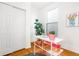 Bright office space with white walls, a modern desk, and a large window for ample natural light at 2211 W 33Rd Ave, Denver, CO 80211