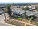 An aerial view showcasing the charming brick home with its well-kept front yard and unique rock border at 493 S Lincoln St, Denver, CO 80209