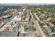 Urban aerial view showcasing city skyline and neighborhood with mature trees and convenient access at 493 S Lincoln St, Denver, CO 80209