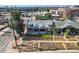 An aerial view showcasing the charming brick home with its well-kept front yard and unique rock border at 493 S Lincoln St, Denver, CO 80209
