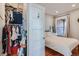Bedroom walk-in closet featuring functional organization system, access to bedroom with a view at 493 S Lincoln St, Denver, CO 80209