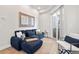 Cozy living room with comfortable seating, modern decor, and ample natural light at 2321 Eliot St, Denver, CO 80211