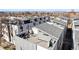 Relaxing rooftop deck with outdoor seating and stylish decor, perfect for enjoying city views at 2321 Eliot St, Denver, CO 80211