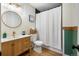 Charming bathroom with a stylish vanity, modern fixtures, and a bathtub/shower combo at 201 Wright St # 106, Lakewood, CO 80228