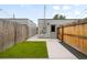 A well-kept backyard presents a blend of modern design and natural elements, ideal for relaxing outdoors at 2179 S Bannock St, Denver, CO 80223